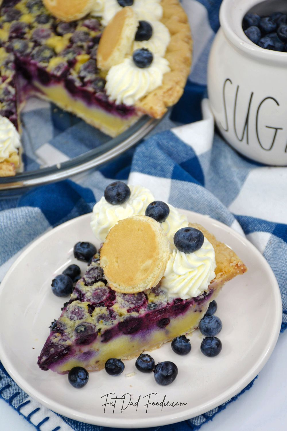 blueberry pancake pie with jar of berries