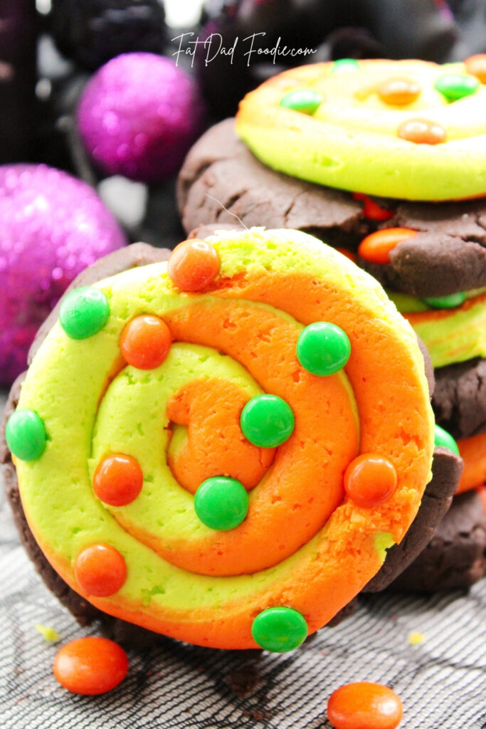 orange and green halloween cookies with candy