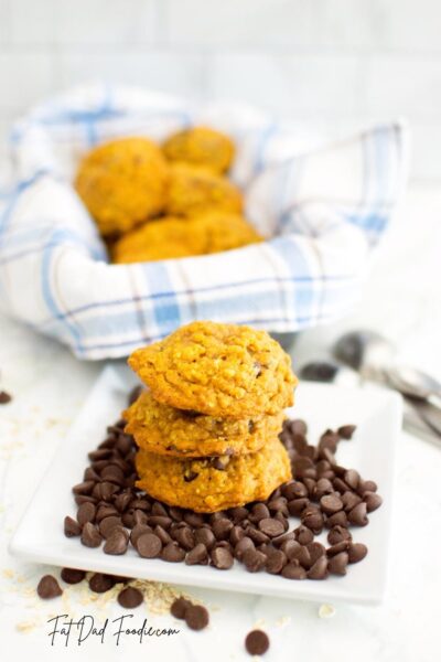pumpkin oatmeal cookies in plate of chocolate chips