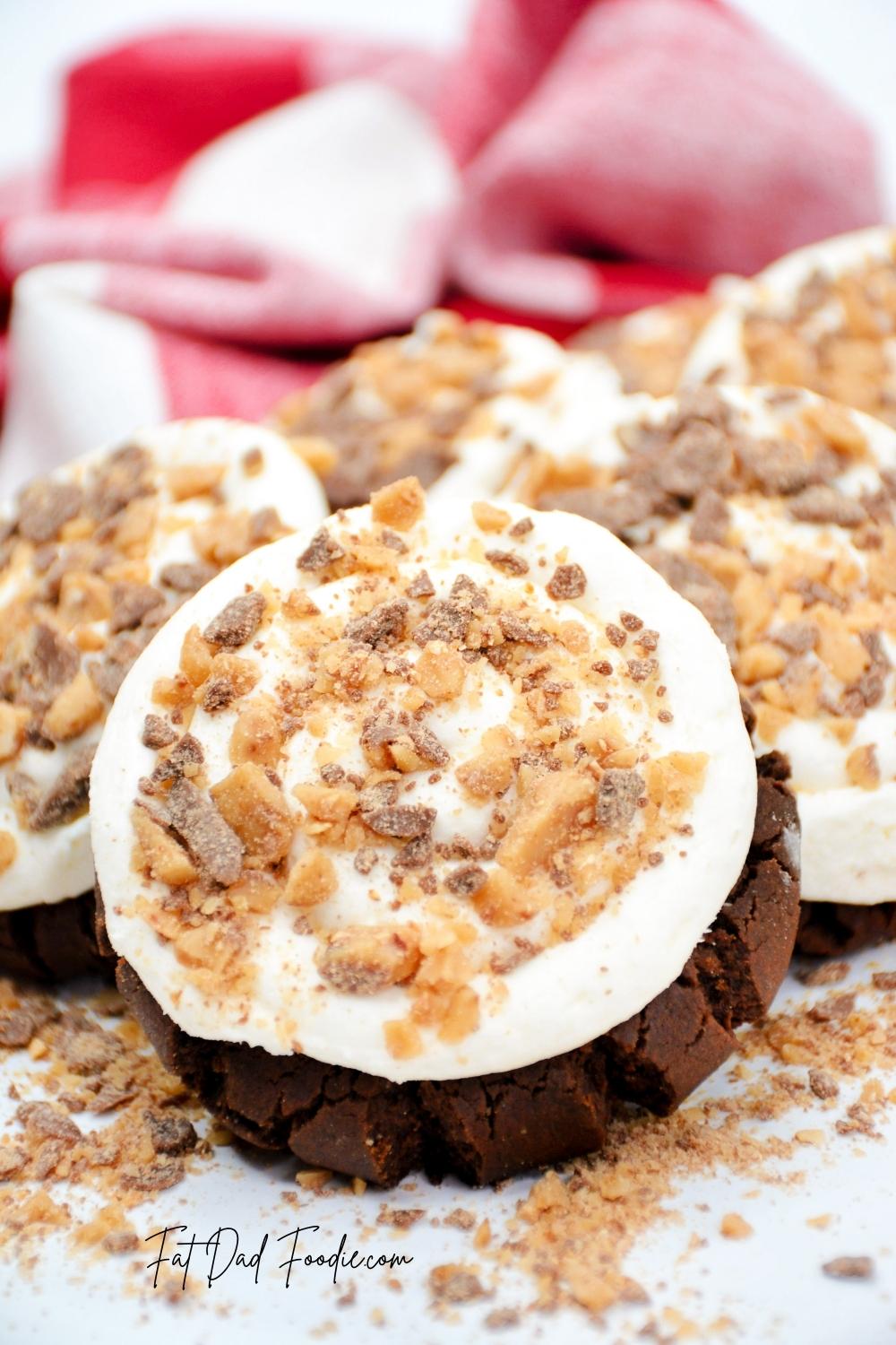 crumbl heath bar cookie recipe on red and white towel