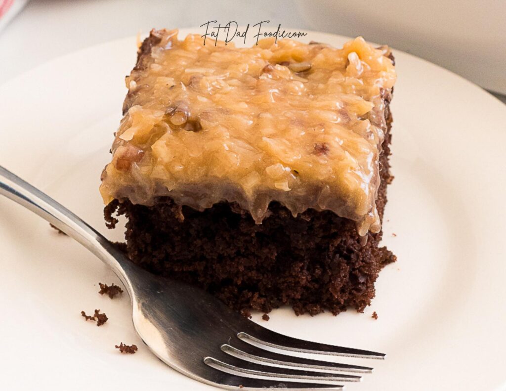 closeup german chocolate poke cake on plate