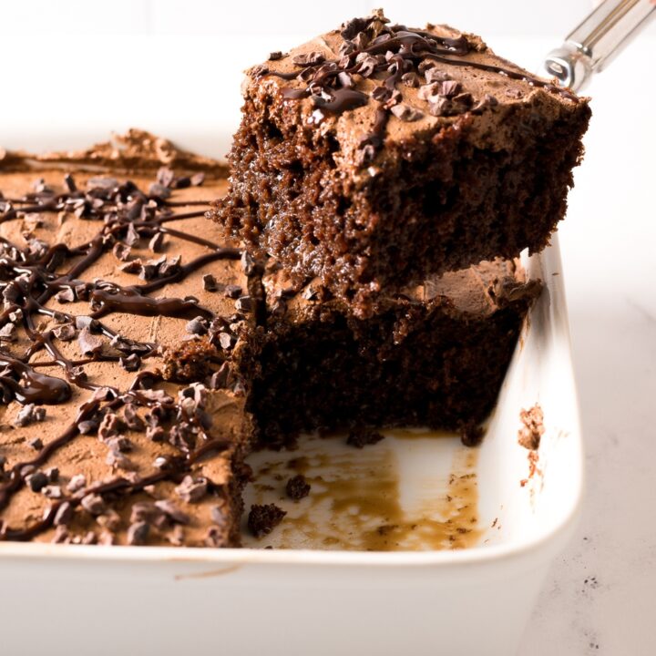 death by chocolate poke cake with chocolate sauce