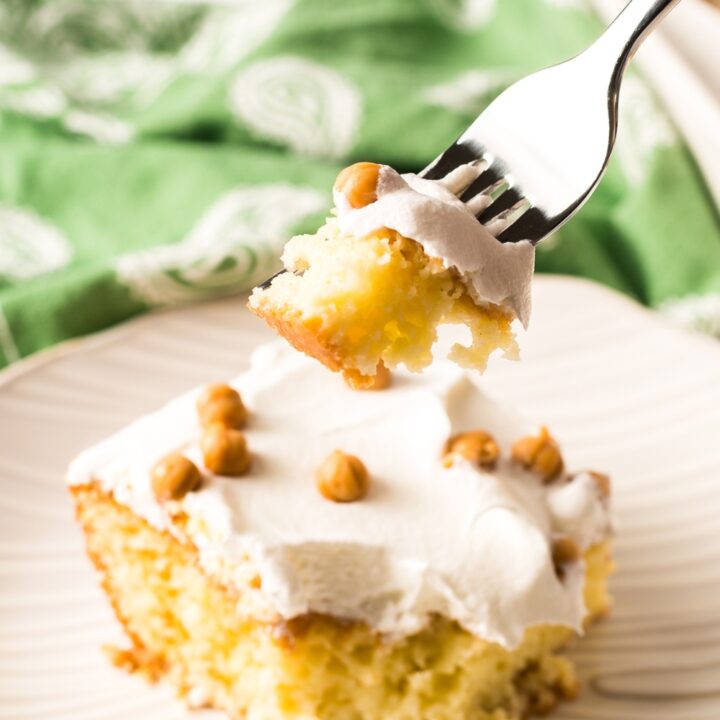 vanilla poke cake recipe forkful