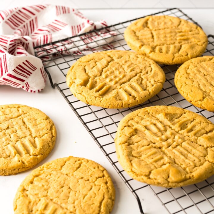 crumbl peanut butter cookies on cooling rack